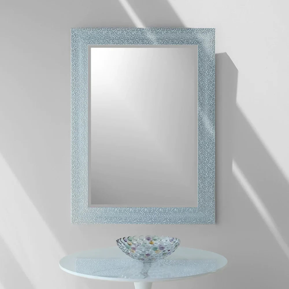 Soft Turquoise mirror on light grey wall above a small pedestal table and patel colored glass bowl - from Great Kitchens & Appliances