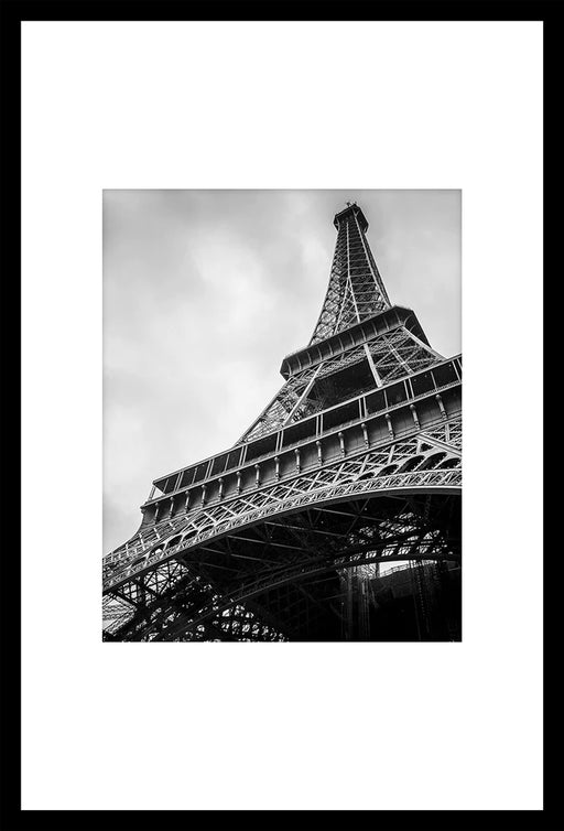 Photography of Eiffel Tower from below, framed under glass, measuring 20x30 inches by JORGE.